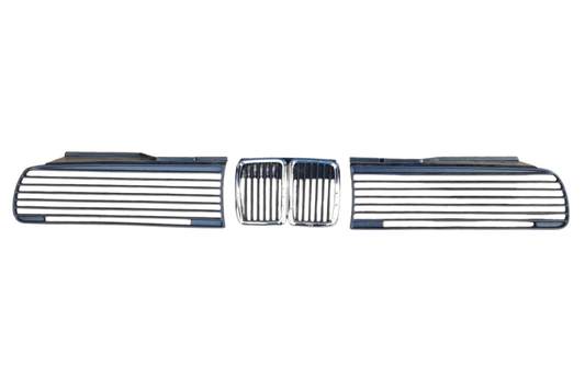 BMW E30 Series 3 headlights and front grille by K2 Industries, showcasing the classic design from 1984 to 1991.
