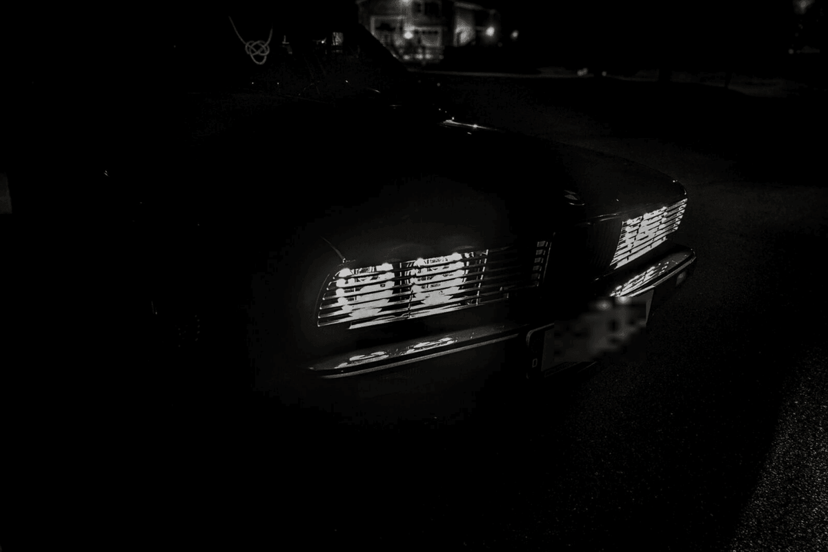 BMW E30 Series 3 headlights and front grille by K2 Industries, showing the sleek design of the 1984-1991 model.