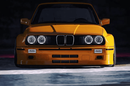BMW E30 Series 3 headlights and front grille by K2 Industries, showcasing the classic design from 1984 to 1991.