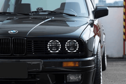 BMW E30 Series 3 front grille and headlights by K2 Industries, showcasing the classic design of 1984-1991 models.