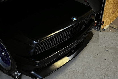 BMW E30 Series 3 front grille and headlights by K2 Industries, featuring sleek design for 1984-1991 model years.