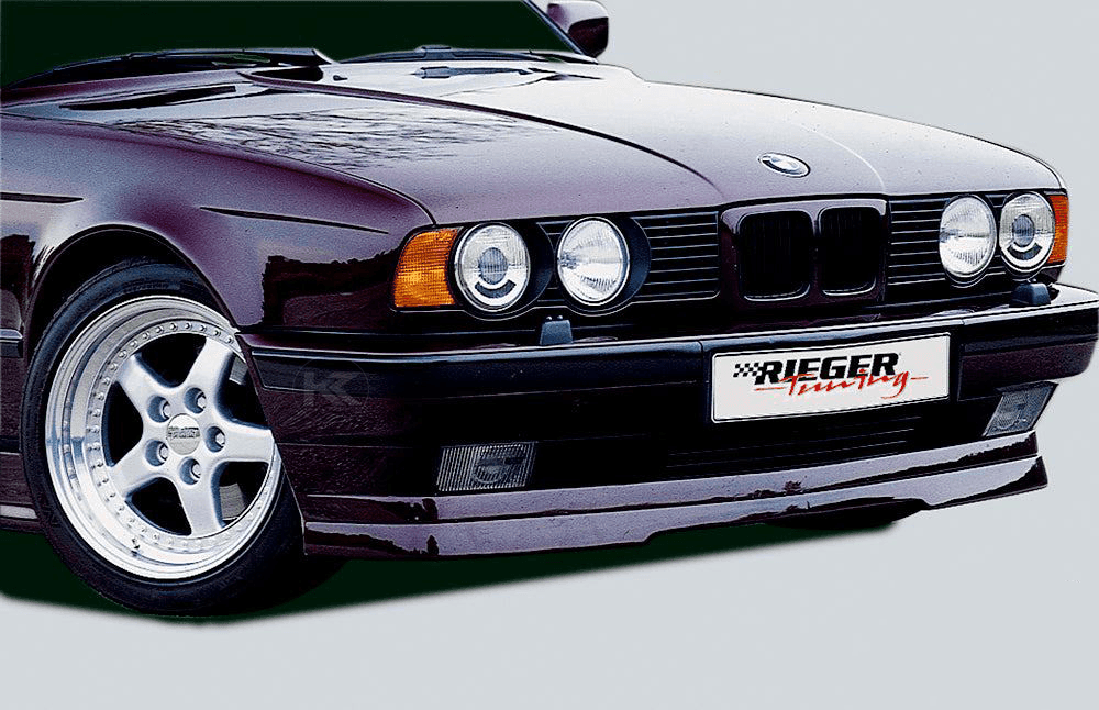 BMW E34 Rieger front lip by K2 Industries, sleek aerodynamic car accessory for enhanced front end style.