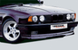 BMW E34 Rieger front lip by K2 Industries, sleek aerodynamic car accessory for enhanced front end style.