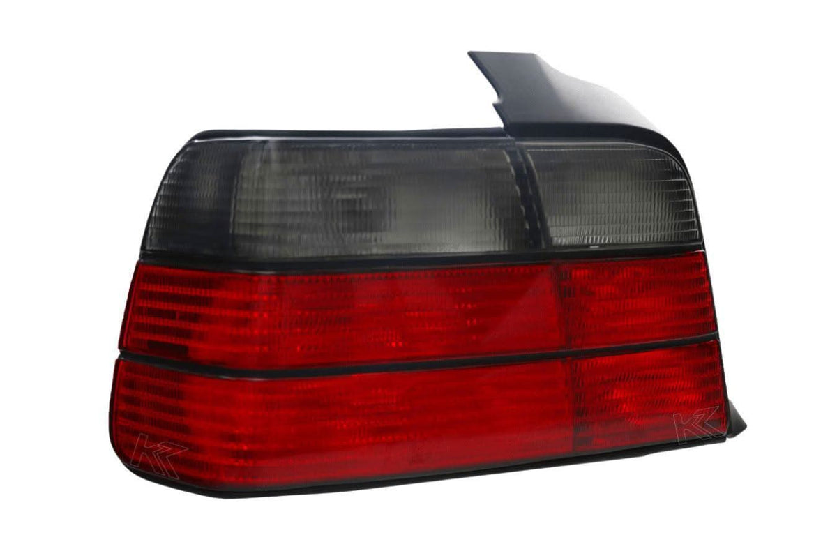 BMW E36 4-door tail lights by K2 Industries, showing the clear lens and red and amber sections for 1992-1999 models.