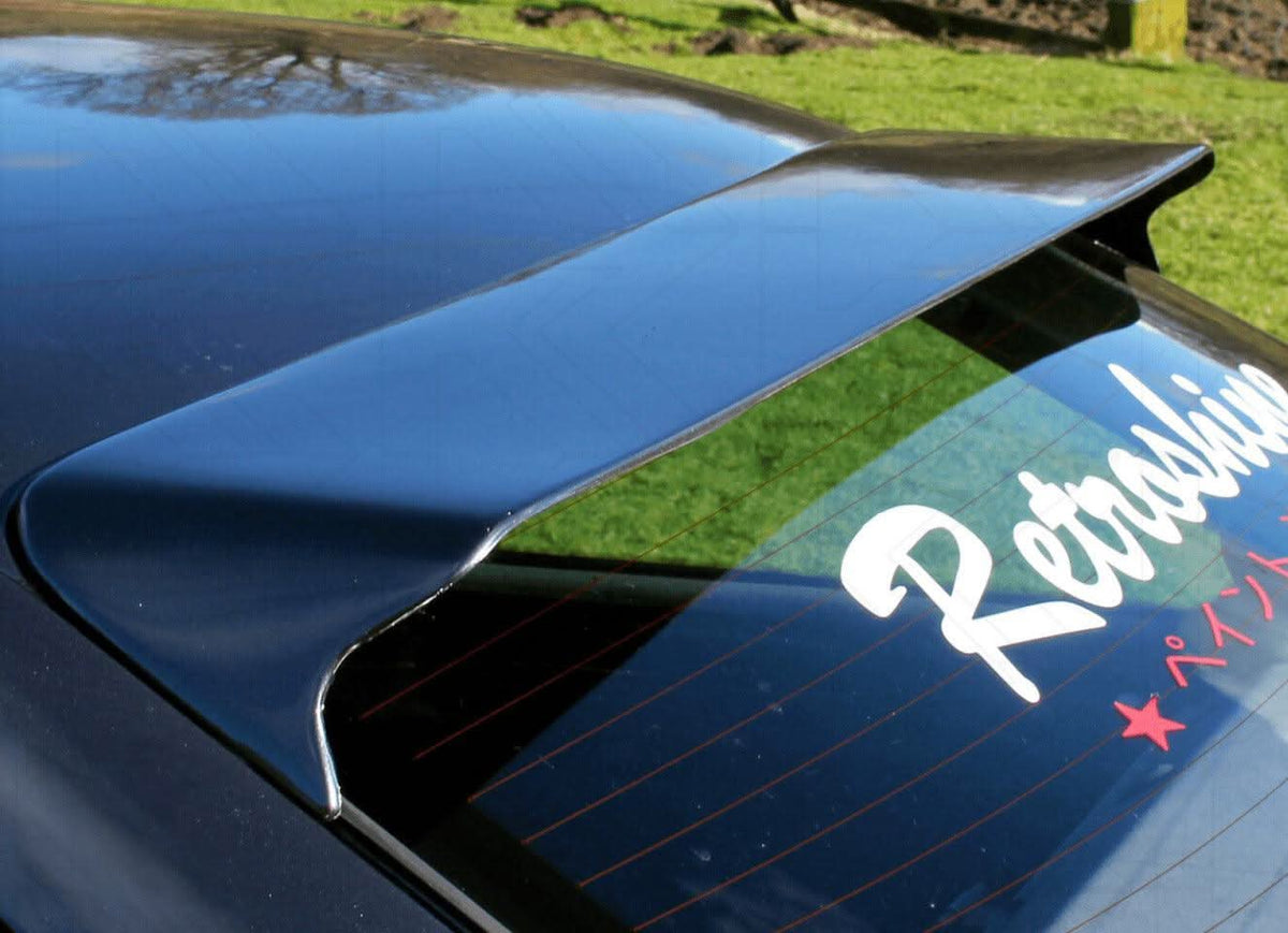 Black K2 Industries roof wing for BMW E36 Coupe Series 3, 1990-2000, mounted on the car's rear roof area.