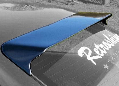 Black BMW E36 Coupe Series 3 HM roof spoiler by K2 Industries, mounted on the car's rear roof area, enhances sporty appearance.