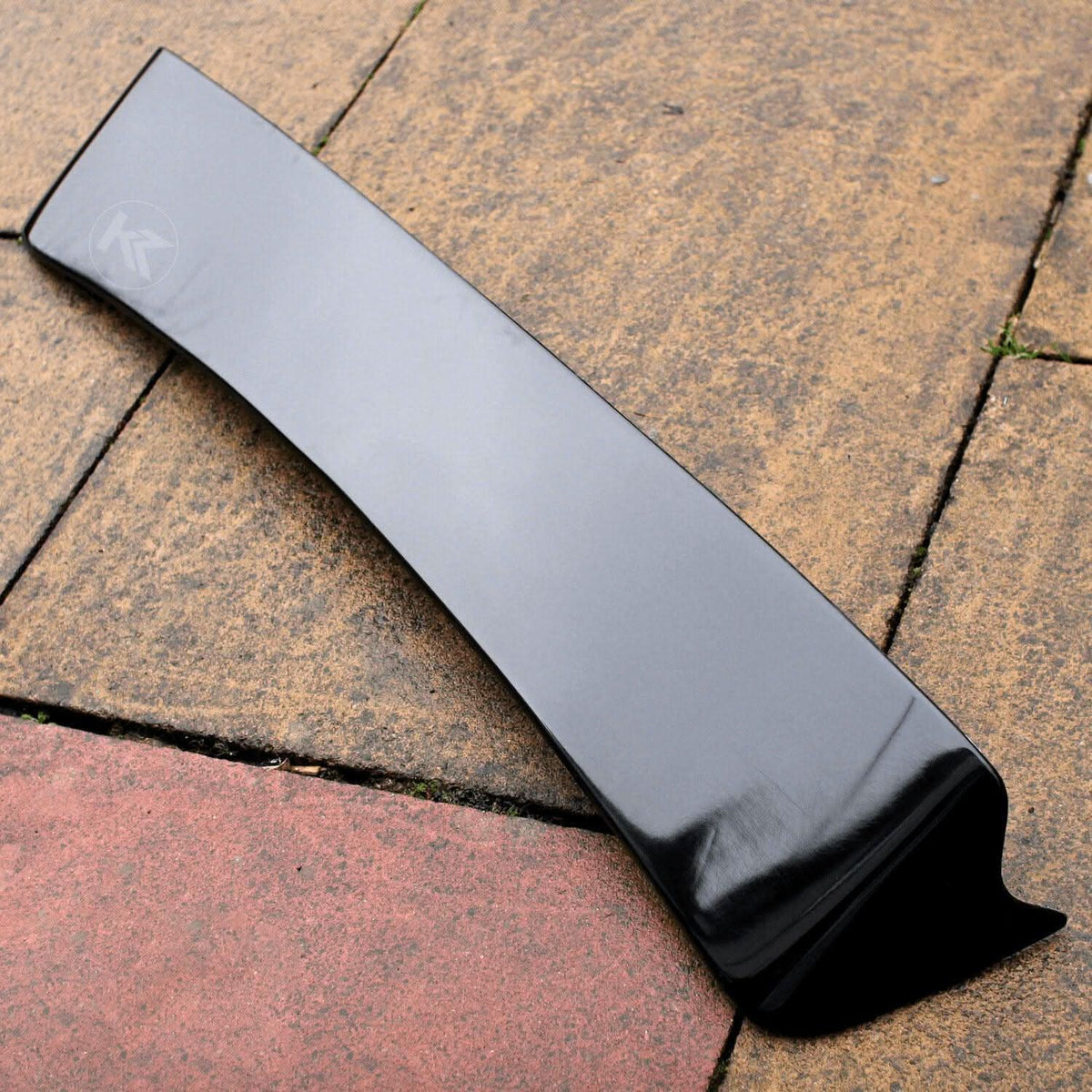 Black BMW E36 Coupe Series 3 HM roof spoiler by K2 Industries, showing the sleek roof wing design on the car.