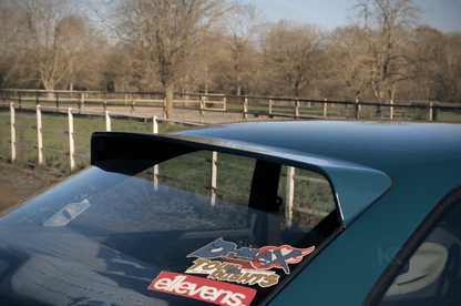 Black BMW E36 Coupe Series 3 HM Roof Spoiler V2 by K2 Industries on a 1990-2000 model, showcasing the sleek roof wing design.