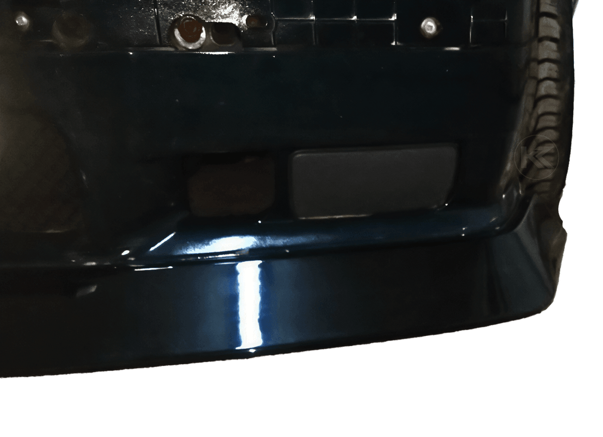 BMW E36 JDM Style Front Lip V2 by K2 Industries, front bumper lip for 1992-1999 BMW E36 models, shown in black with aerodynamic design.