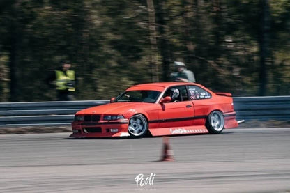 BMW E36 JDM Style Front Lip V2 by K2 Industries, installed on a 1992-1999 model, showing the sleek front lip design.