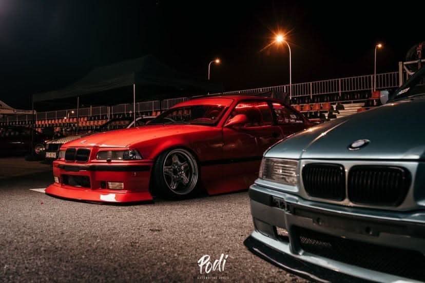 BMW E36 JDM Style Front Lip V2 by K2 Industries installed on a 1992-1999 model, showing sleek front lip design and fitment.