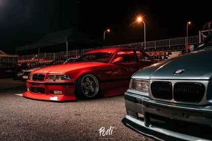 BMW E36 JDM Style Front Lip V2 by K2 Industries installed on a 1992-1999 model, showing sleek front lip design and fitment.