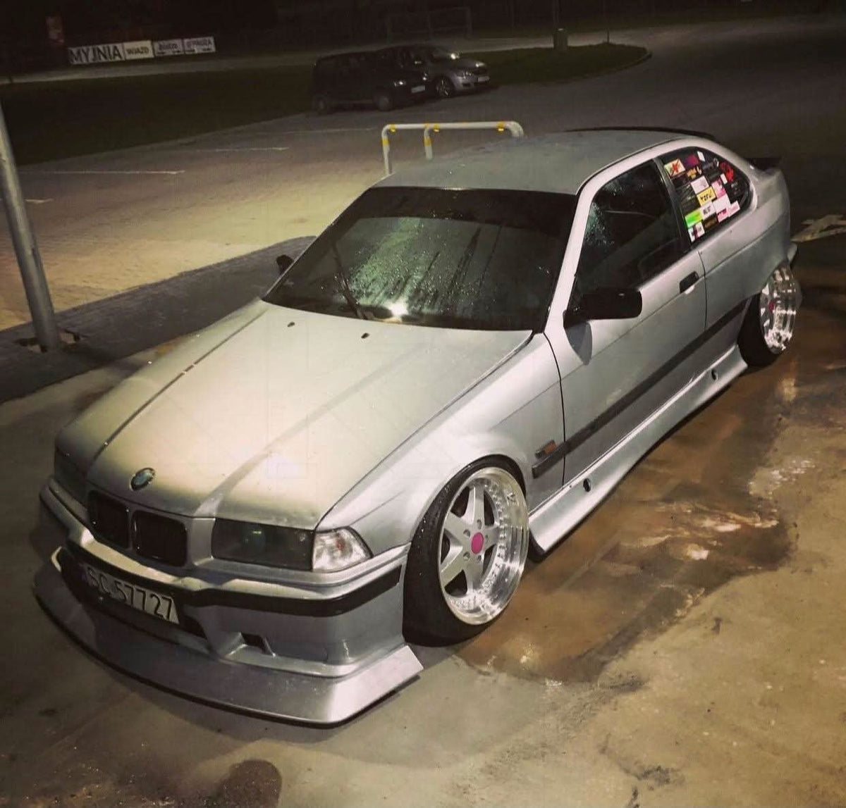 BMW E36 JDM Style Front Lip V2 by K2 Industries, installed on front bumper, showcasing sleek aerodynamic design for 1992-1999 models.
