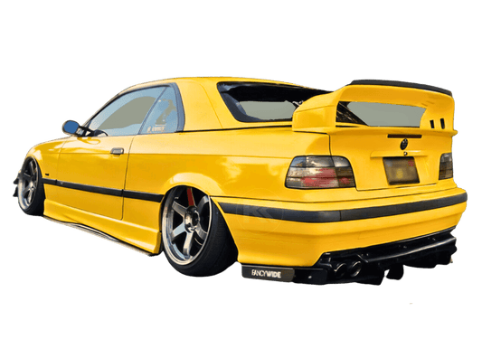 Black BMW E36 M3 Series 3 side skirt extensions by K2 Industries, designed for 1992-1999 models, installed along the vehicle's side.