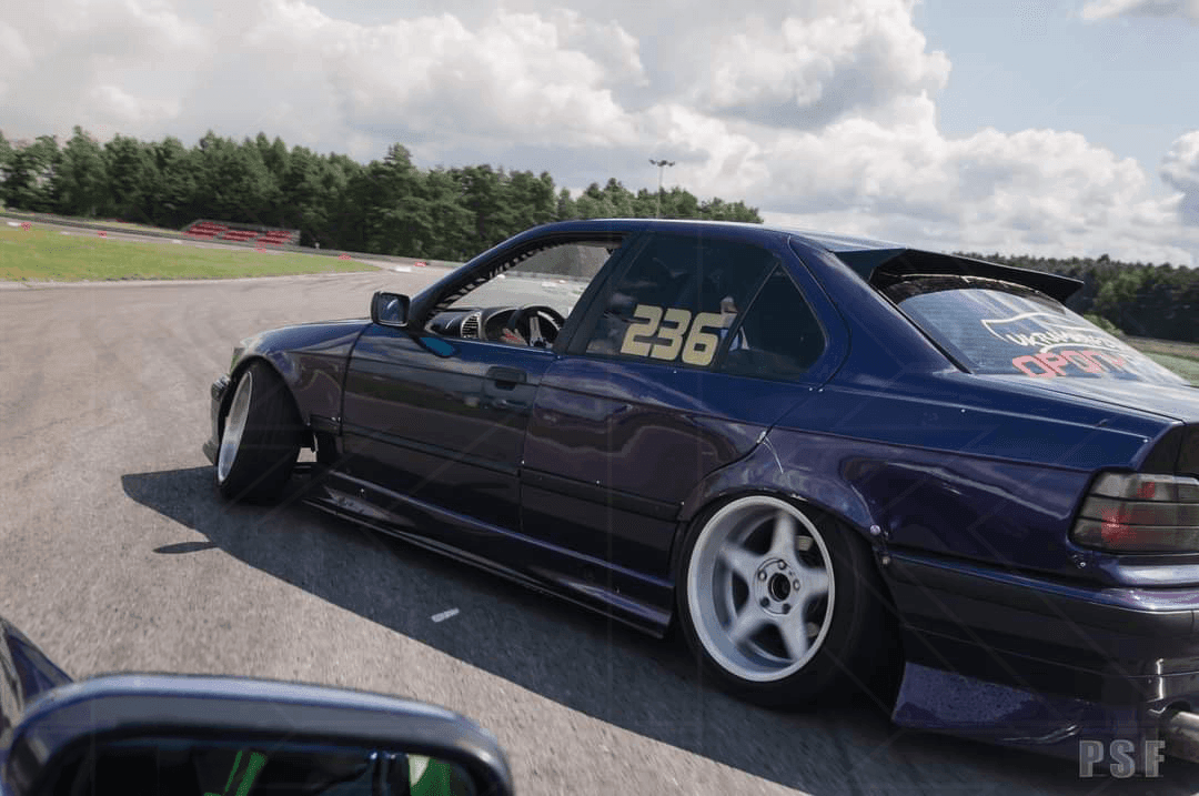 BMW E36 M3 Series 3 black side skirt extensions by K2 Industries, showing the sleek exterior design on a 1992-1999 model.