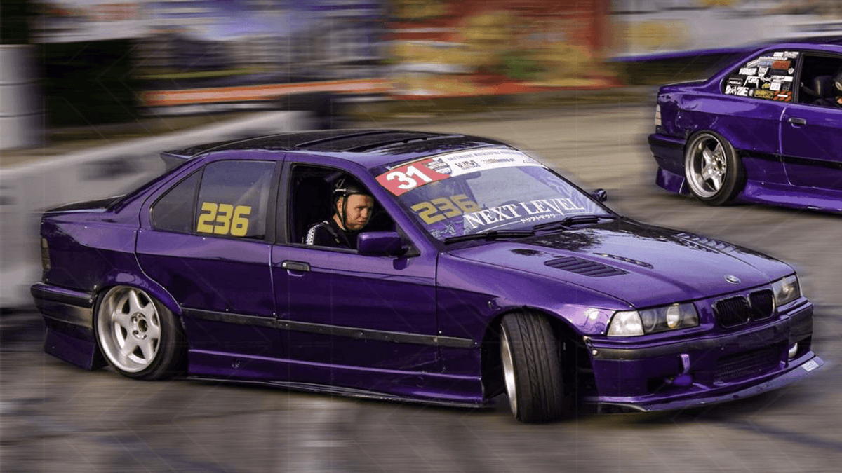 Black BMW E36 M3 Series 3 side skirt extensions by K2 Industries, designed for 1992-1999 models, shown installed on the car.