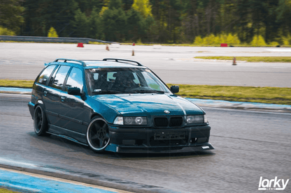 BMW E36 M3 Series 3 black side skirt extensions by K2 Industries, showcasing sleek car side profile from 1992-1999.