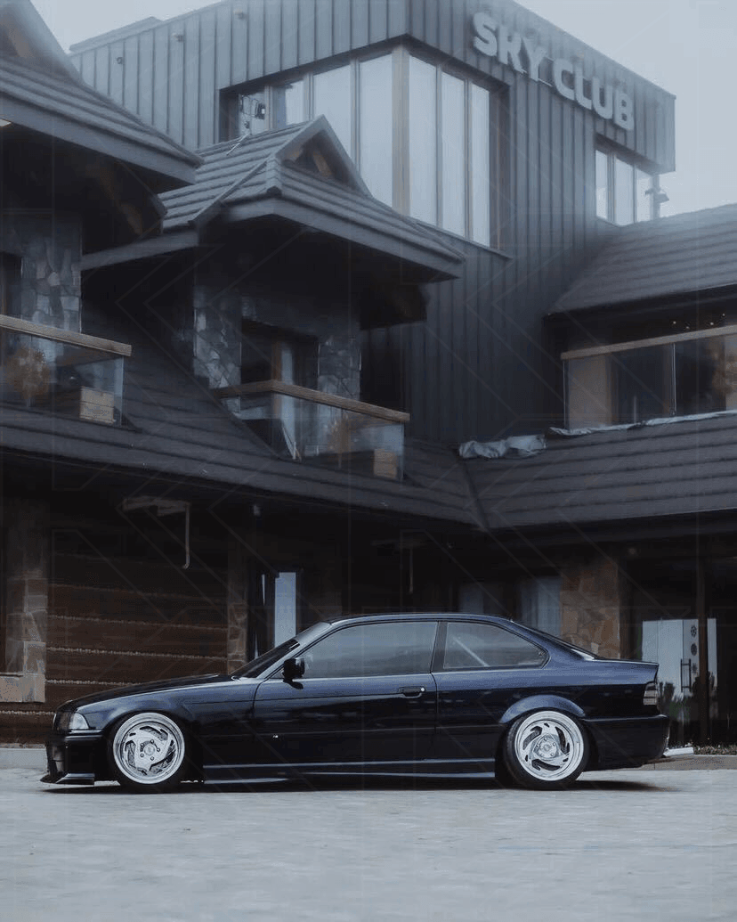 BMW E36 M3 Series 3 JDM Style front lip by K2 Industries installed on a 1992-1999 model, showing sleek aerodynamic design.