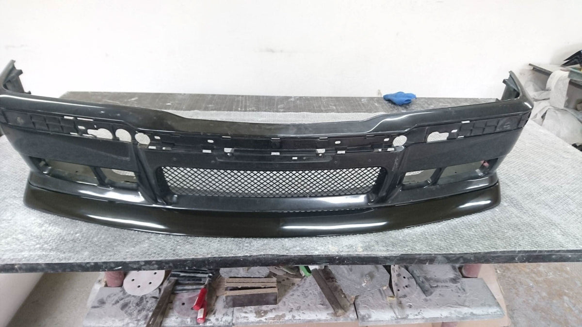 BMW E36 M3 Series 3 JDM style front lip by K2 Industries installed on a 1992-1999 model, showcasing its sleek design.