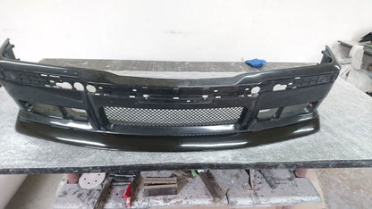 BMW E36 M3 Series 3 JDM style front lip by K2 Industries installed on a 1992-1999 model, showcasing its sleek design.