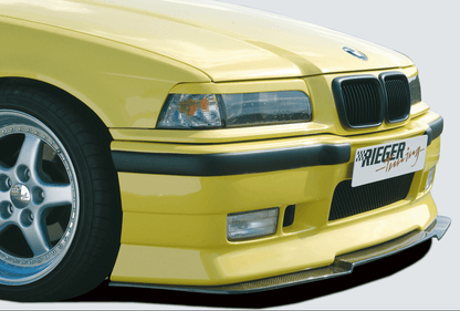 BMW E36 Rieger headlight eyebrows by K2 Industries for sedan, compact, and wagon models from 1990-1999, shown on vehicle.