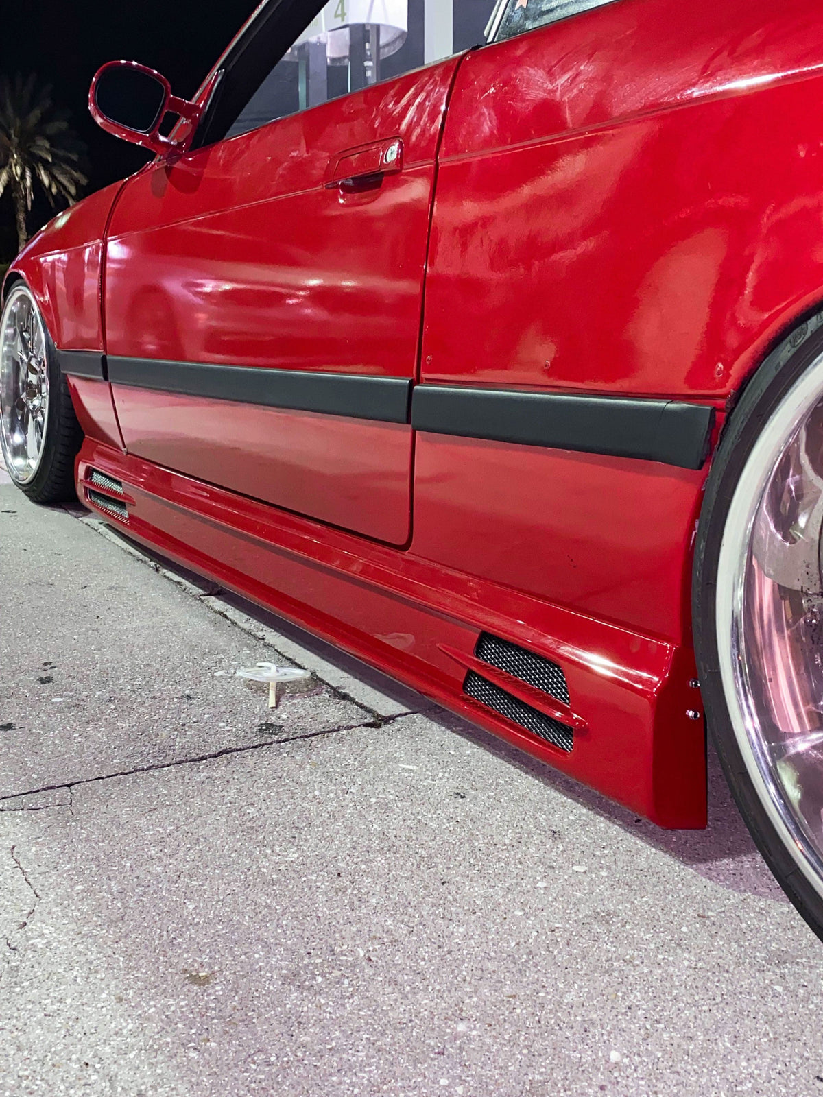 BMW E36 Rieger vented side skirts by K2 Industries, designed for 1990-1999 coupe and sedan models, featuring a sleek vented style.