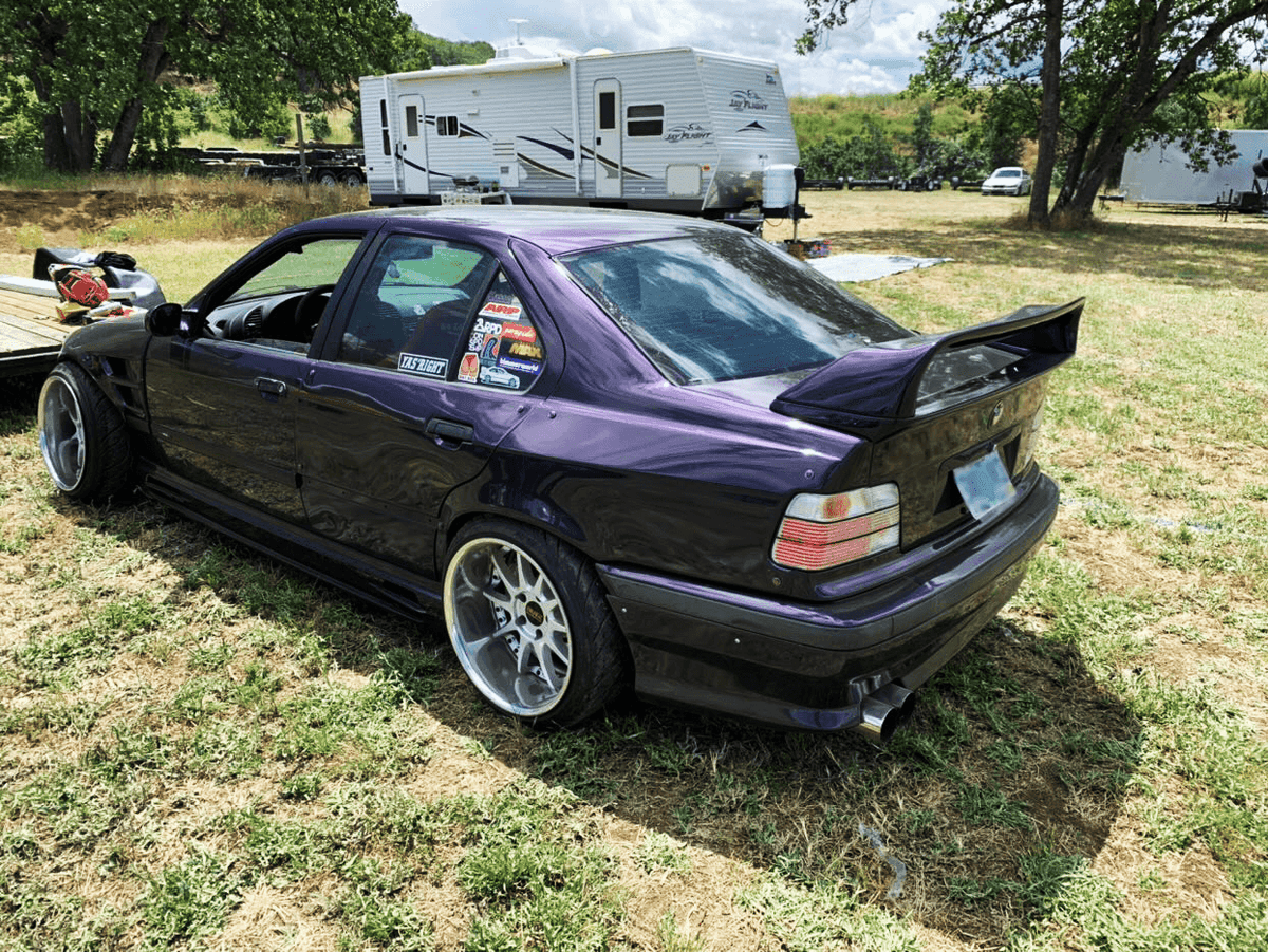 BMW E36 Rieger vented side skirts by K2 Industries for 1990-1999 models, showing sleek, aerodynamic side panels with vented design.