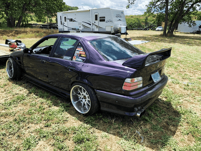 BMW E36 Rieger vented side skirts by K2 Industries for 1990-1999 models, showing sleek, aerodynamic side panels with vented design.