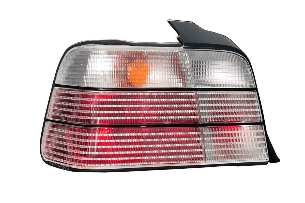 BMW E36 sedan clear OEM style tail lights by K2 Industries, showing the sleek, transparent design for 1990-1999 models.
