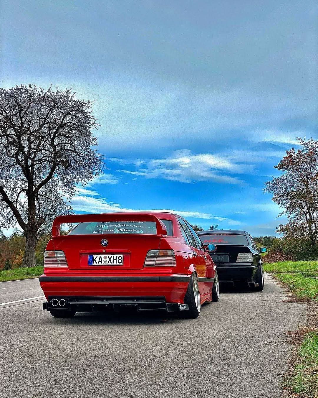 BMW E36 Sedan clear OEM-style tail lights by K2 Industries, showing the sleek, transparent design for 1990-1999 models.