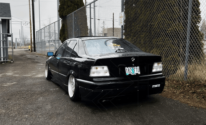 BMW E36 Sedan custom clear tail lights by K2 Industries, V3 model, for 1992-1999 BMW E36 vehicles, showcasing sleek clear lens design.
