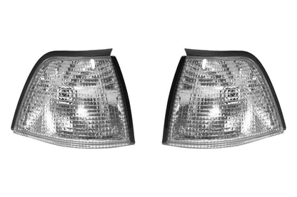 BMW E36 sedan and compact clear corner lights by K2 Industries, front view showing sleek, transparent turn signal lenses.