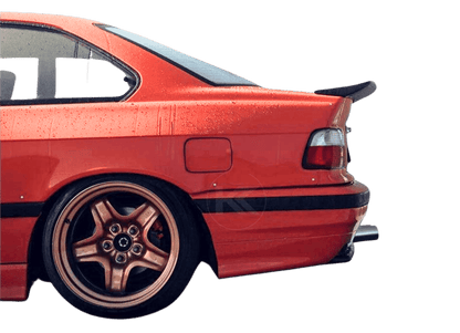 BMW E36 Series 3 drag wing style trunk spoiler by K2 Industries, showing the sleek aerodynamic design on the car's rear.