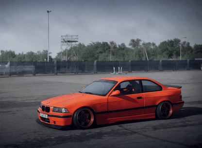 BMW E36 Series 3 drag wing style trunk spoiler by K2 Industries, installed on a 1992-1999 model, shown from side view.