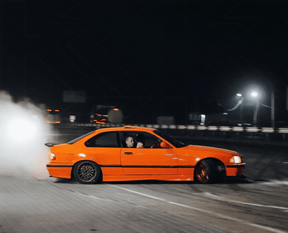 BMW E36 Series 3 drag wing style trunk spoiler by K2 Industries, showcasing the aerodynamic spoiler on the car trunk.