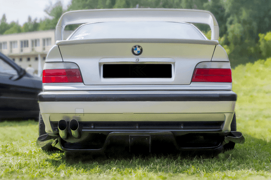 BMW E36 Series 3 MaxStyle rear diffuser by K2 Industries, for 1992-1999 models, showing the black aerodynamic car part