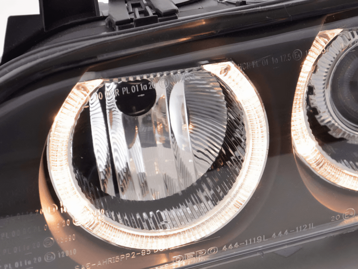 BMW E39 5-Series Xenon Angel Eye Rings Headlights by K2 Industries showing dual illuminated rings on black housing, 1995-2000 model