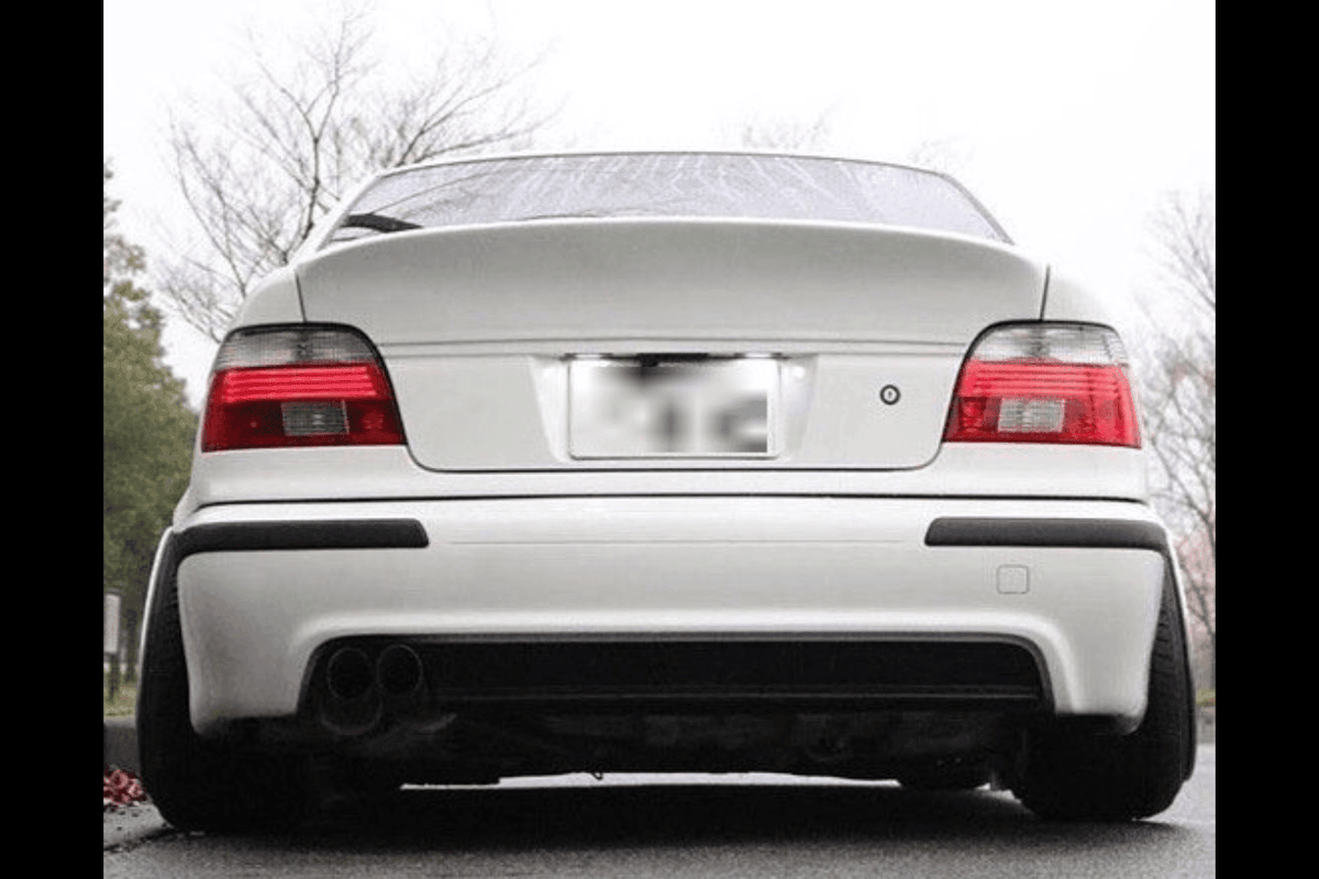 BMW E39 Series 5 CSL-inspired ducktail trunk spoiler by K2 Industries, showing the sleek, aerodynamic design on the car's rear.