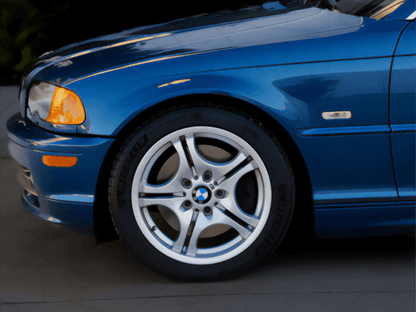 BMW E46 2D/Cabrio and 99-01 BMW 4D/5D side indicator lights by K2 Industries, crystal clear or smoke finish, shown installed on vehicle.