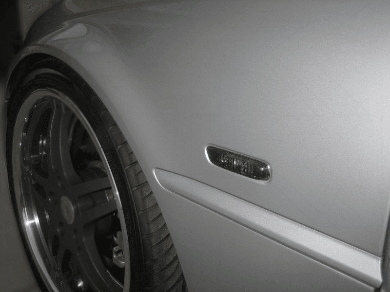 BMW E46 2-door and 4/5-door side indicator lights by K2 Industries in clear or smoke finish, for 1999-2003 models.