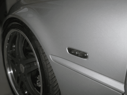 BMW E46 2-door and 4/5-door side indicator lights by K2 Industries in clear or smoke finish, for 1999-2003 models.