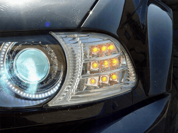 BMW E46 2D/Cabrio crystal clear screw-on LED corner lights by K2 Industries, showing front view with clear lenses and mounting details.