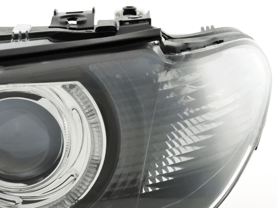 BMW E46 3-Series Coupe black OE+ Angel Eyes headlights by K2 Industries, for 2002-2005 model with clear lens and LED accents.