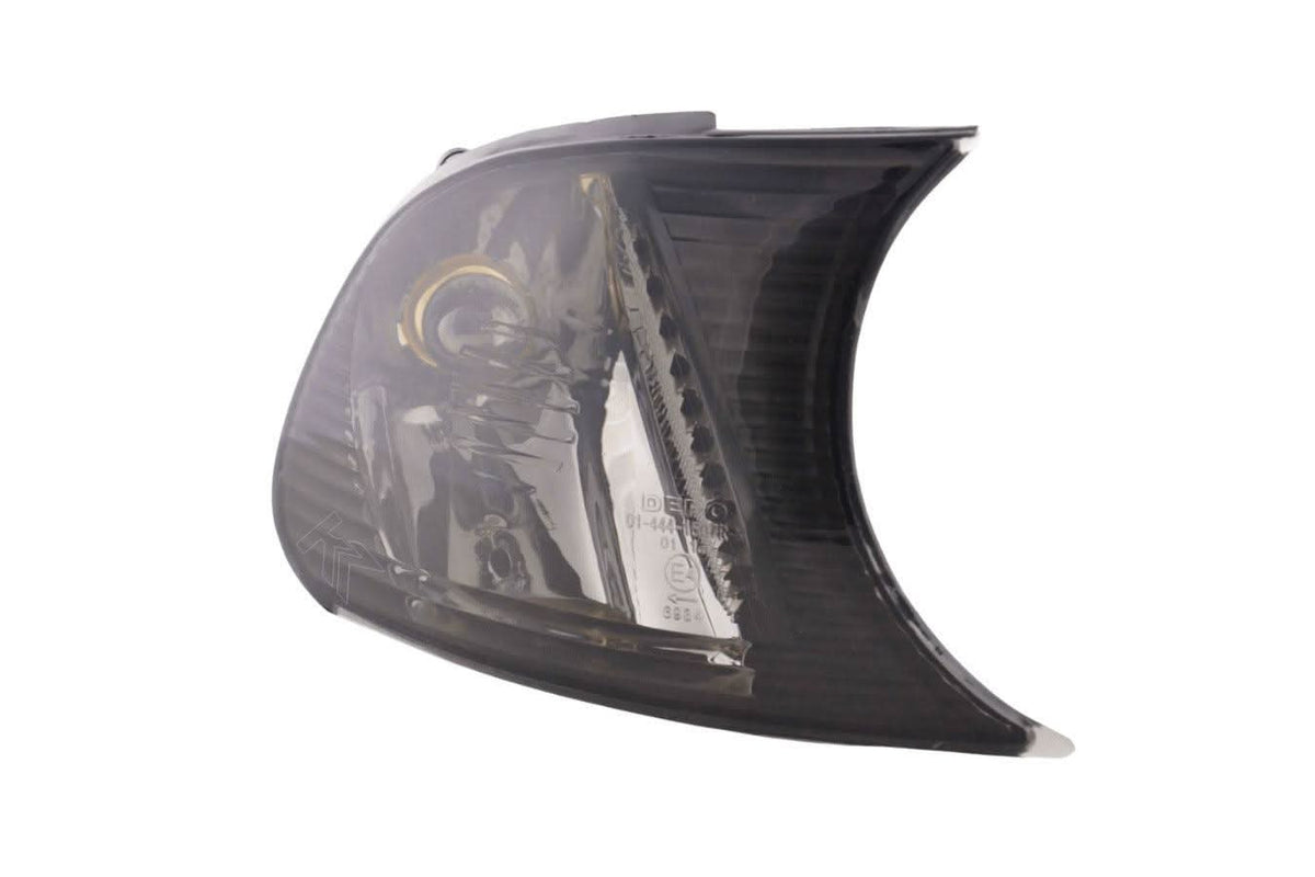 BMW E46 coupe and convertible smoked clear clip-on corner lights by K2 Industries, for models 1998-2001, shown installed on the vehicle.