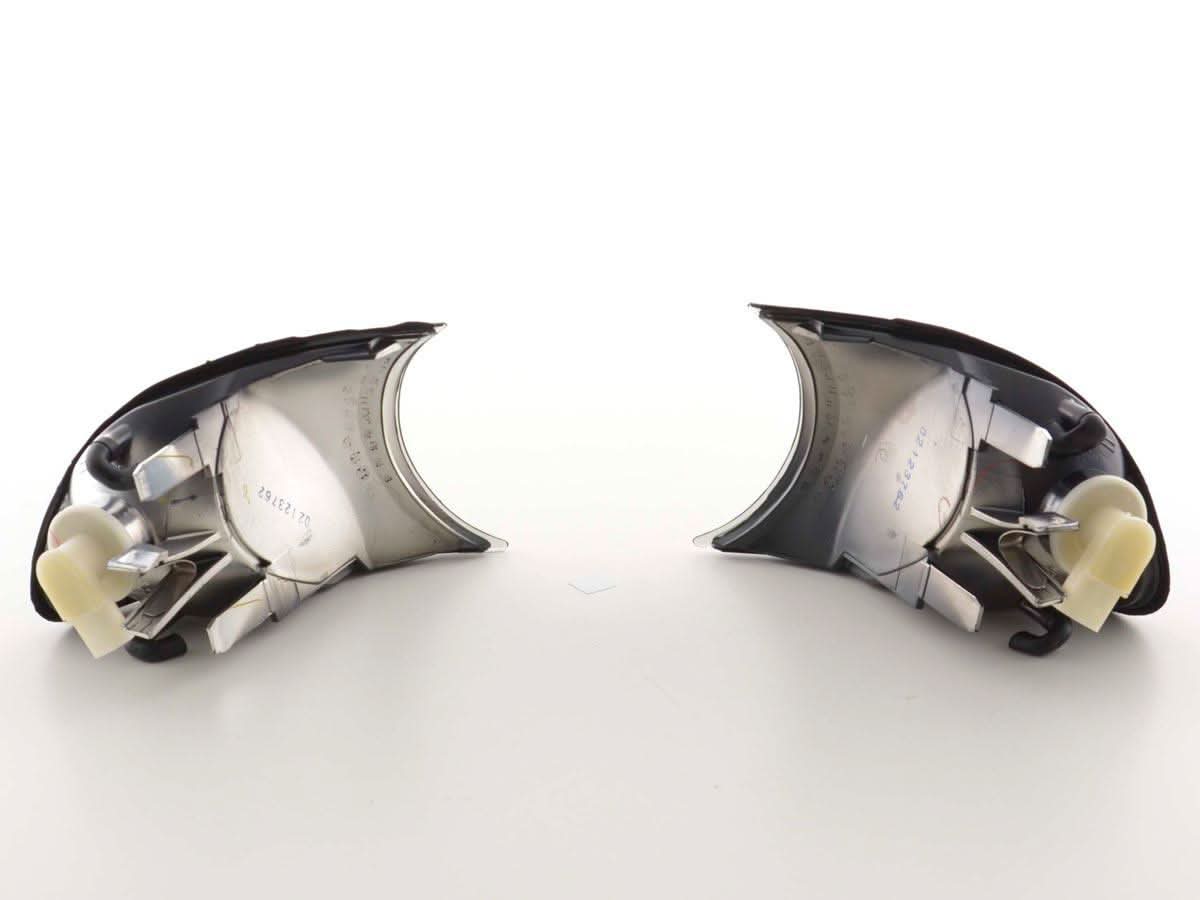 BMW E46 coupe and convertible smoked clear clip-on corner lights by K2 Industries, for models 1998-2001, showing the clear lens design.