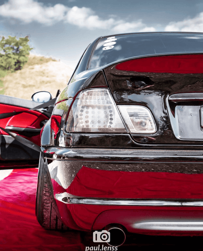 BMW E46 Coupe clear smoked LED tail lights by K2 Industries, showcasing sleek, modern tail light design for 1999-2005 models.