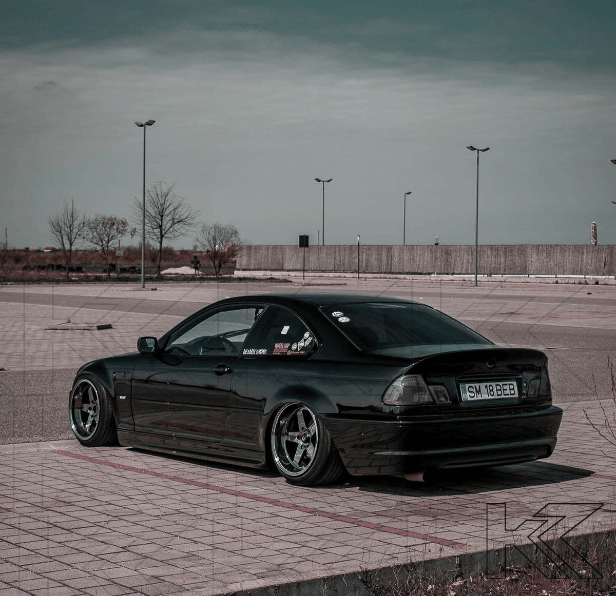 BMW E46 Coupe clear smoked LED tail lights by K2 Industries, showcasing sleek design and modern LED lighting.