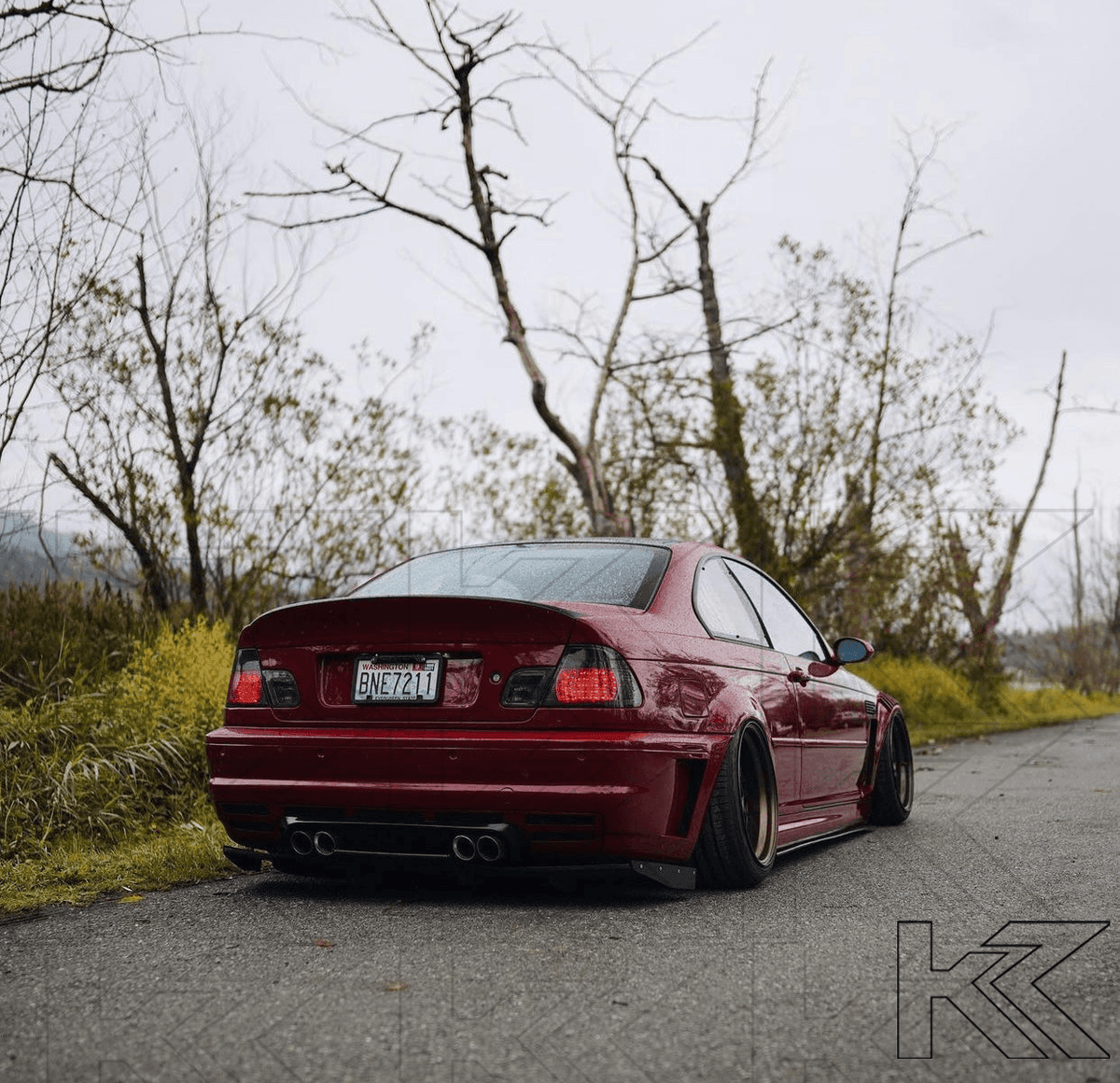 BMW E46 Coupe clear smoked LED tail lights by K2 Industries, showing the sleek, smoked lens design and LED light details.