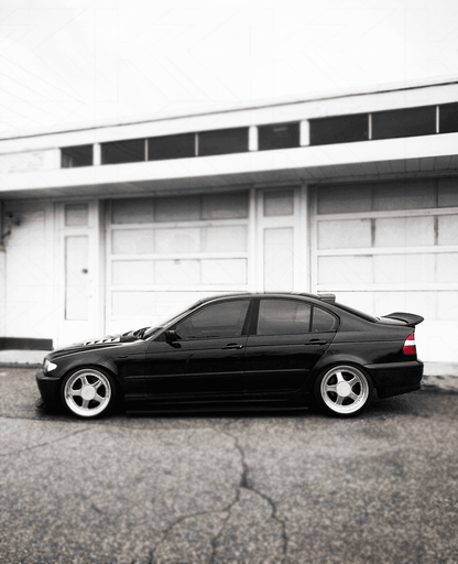 BMW E46 Series 3 drag wing trunk spoiler by K2 Industries, showing the sleek aerodynamic design on the car's rear.