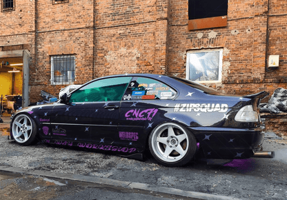 BMW E46 Series 3 drag wing style trunk spoiler by K2 Industries, shown on the car's rear hatch for model years 1995 to 2005.